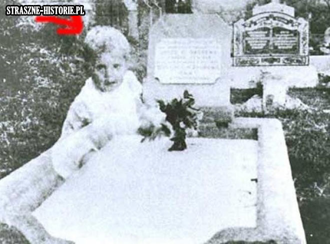 Dziecko przy grobie.